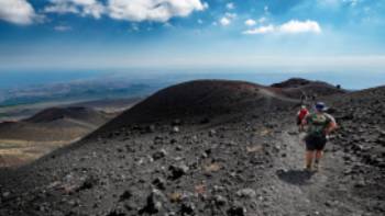 Hiking on Mount Etna volcano in Italy