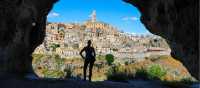 The view of Matera from inside a cave at Murgia National Park