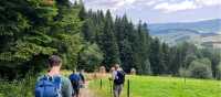 Hikers descending from Mt Turbacz (1310 m) | Kate Baker
