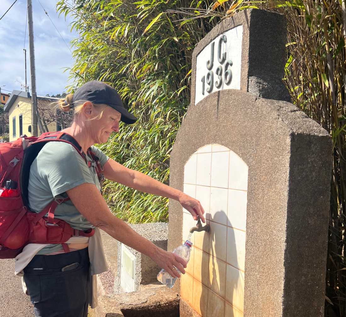 Filling up a water bottle in Madeira | Kate Baker