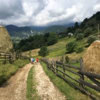 Walkers in Translyvania enroute to Bran Castle | Kate Baker