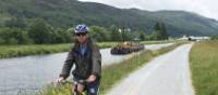 Cycling the canalways of Scotland with the Barge Fingal cruising behind