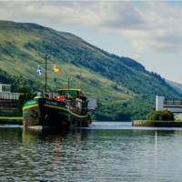The Ros Crana barge leaving Loch Oich