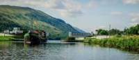 The Ros Crana barge leaving Loch Oich