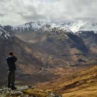 Views of snow-capped mountains along the West Highland Way
