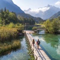 Walking over a picturesque bridge in Slovenia