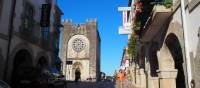Pilgrims enjoy a stroll through Portomarin after a day walking on the Camino | Sue Finn