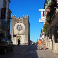 Pilgrims enjoy a stroll through Portomarin after a day walking on the Camino | Sue Finn