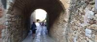 Laneway in the medieval village of Peratallada, visited on a self guided cycle trip in Catalonia | Kate Baker