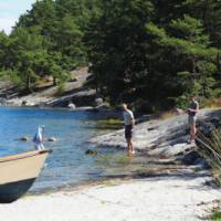 Locals relaxing on the waters edge | Kathy Kostos