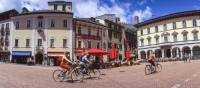 Cycle through quaint old villages on your way to one of the lakes in the Ticino region of Switzerland