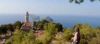 Hiker enjoying the view of Cape Gelidonia lighthouse and the 'Five Islands' | Lilly Donkers