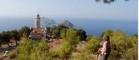 Hiker enjoying the view of Cape Gelidonia lighthouse and the 'Five Islands' |  <i>Lilly Donkers</i>