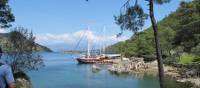 Boat moored at the ruins of 'Cleopatra's baths' on our Turkey Walk & Sail | Kate Baker