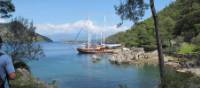 Boat moored at the ruins of 'Cleopatra's baths' on our Turkey Walk & Sail | Kate Baker