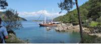 Boat moored at the ruins of 'Cleopatra's baths' on our Turkey Walk & Sail |  <i>Kate Baker</i>