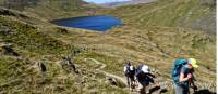 Hikers above Grizedale Tarn in the Lake District |  <i>John Millen</i>