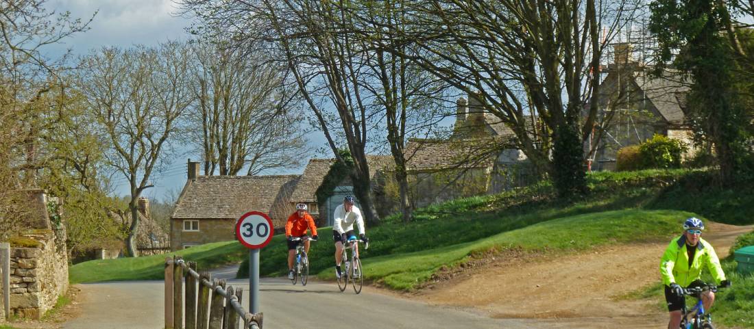 Cycling into Guiting Power |  <i>John Millen</i>