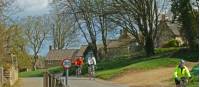 Cycling into Guiting Power |  <i>John Millen</i>