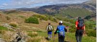 Coast to Coast hikers descending into Borrowdale |  <i>John Millen</i>