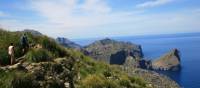 Walkers heading round the coast to Cala Codolar | John Millen