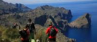 Trekkers walking to Cala Codolar and El Murteret, also known as Morro de Sa Vaca | John Millen
