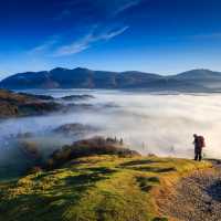 Fell walker ascending Catbells, The Lake District, Cumbria, England
 | Michael Conrad