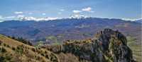 The ruins of chateau Roquefixade with the Pyrenees in the background | Jcb-caz-11