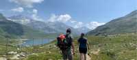 Hikers approaching Montespluga in the Italian Alps