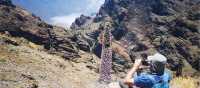 A hiker takes a break on the trails of La Palma