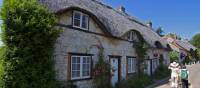 Walkers on the street in charming Brighstone Village, Isle of Wight | visitisleofwight.co.uk