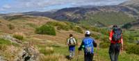 Coast to Coast hikers descending into Borrowdale | John Millen