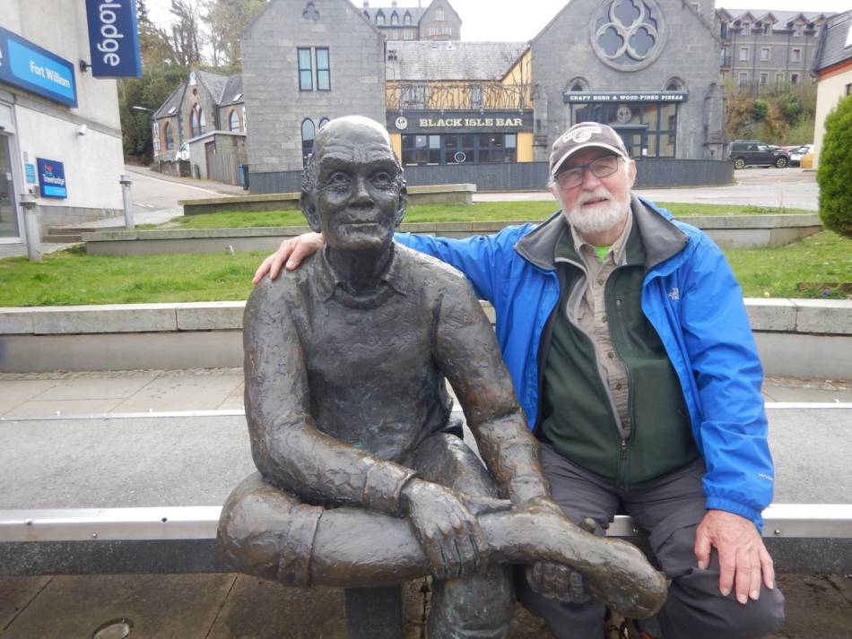 Two gents (one solid, one tired) at the official end of the West Highland Way, in Fort William. | <i>Peter Wells</i>