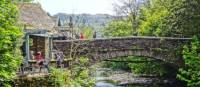 Grasmere Bridge provides a picturesque rest stop on the Coast to Coast Trail | John Millen