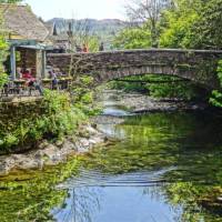 Grasmere Bridge provides a picturesque rest stop on the Coast to Coast Trail | John Millen