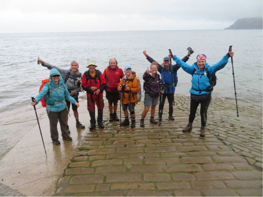 Group of walkers finishes the Coast to Coast at Robin Hood's Bay |  <i>John Millen</i>