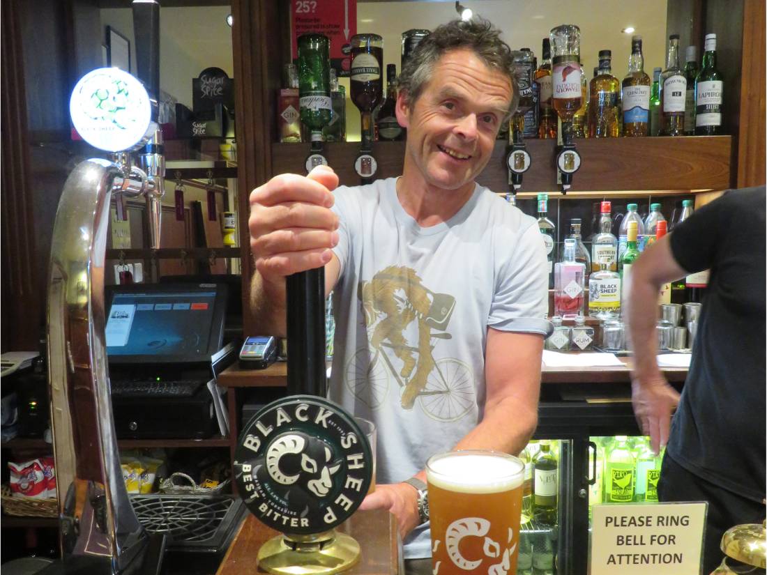 Our guide pulling a pint |  <i>John Millen</i>