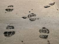 Bootprints on the beach at Lyme
