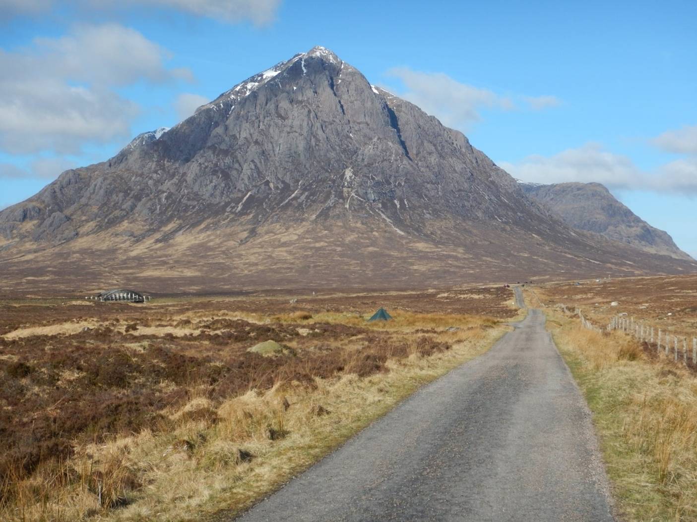 On the old military road just beyond the Kings House Hotel, with a view of the striking mountain, Buachaille Etive Mor, a famous landmark at the entrance of the Glencoe valley. A stunningly clear day. (Day 7). | <i>Peter Wells</i>