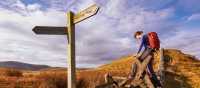 Crossing a stile on the Pennine Way | Duncan Andison