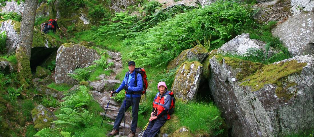 Taking a break at Rob Roy's cave in Scotland