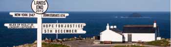 Signpost at Land's End, Cornwall - Photo: Adam Burton