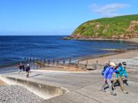 Setting off on the Coast to Coast from St Bees |  <i>John Millen</i>