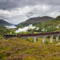 The Jacobite Steam Train Crossing the Glenfinnan Viaduct | Kenny Lam