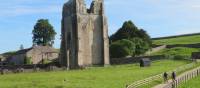 Walkers leaving Shap Abbey | John Millen