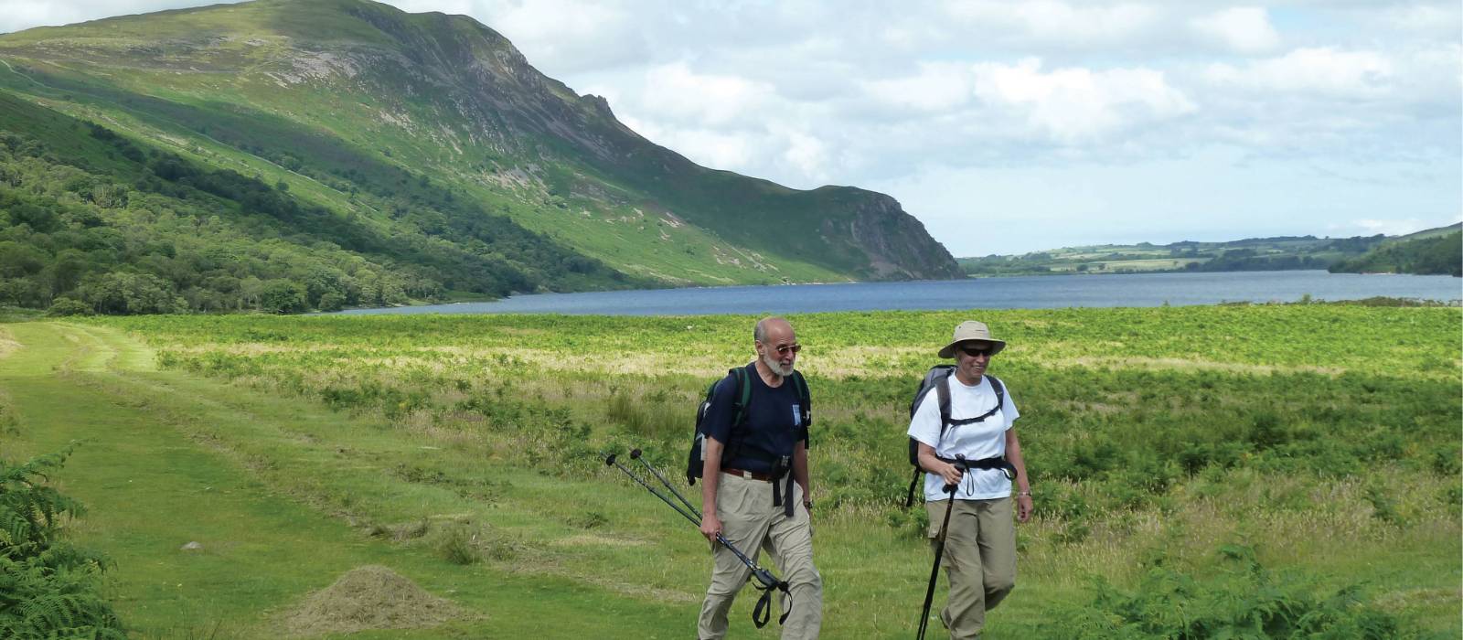 Walkers on the Coast to Coast Trail by Ennerdale Water