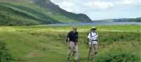 Walkers on the Coast to Coast Trail by Ennerdale Water