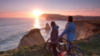 Watch the sun set over the famous Needles, Isle of Wight | visitisleofwight.co.uk