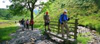 Our group crosses a stream on Wainwright's Coast to Coast walk | John Millen