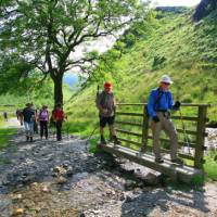 Our group crosses a stream on Wainwright's Coast to Coast walk | John Millen